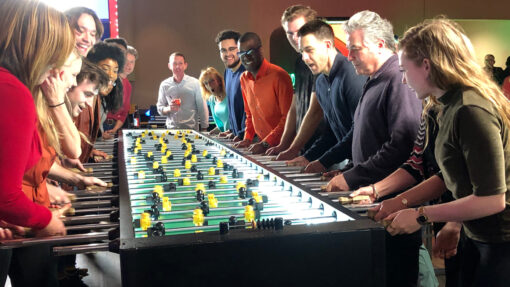 foosball match between coworkers in Dubai